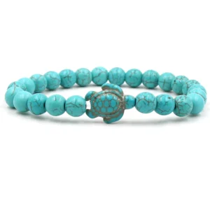 Bracelet de perles turquoise avec une tortue au centre