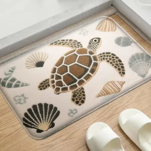 Tapis de bain à motif tortue et coquillages dans des tons sable