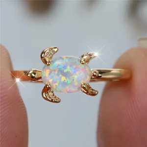 Bague tortue dorée à cabochon clair