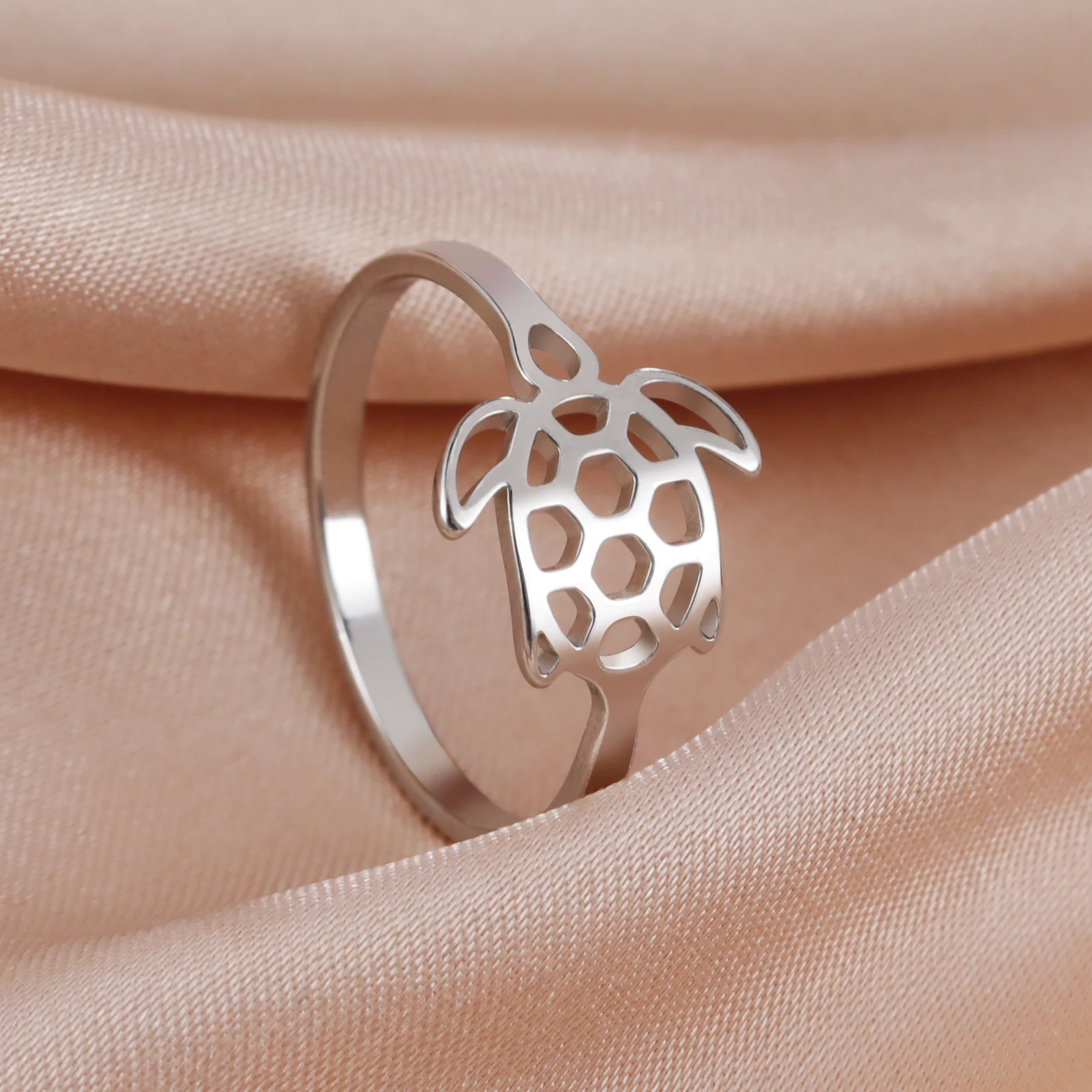 Bague tortue ajourée en acier inoxydable